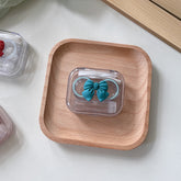 Étui à lentilles de contact coloré transparent et portable avec nœud